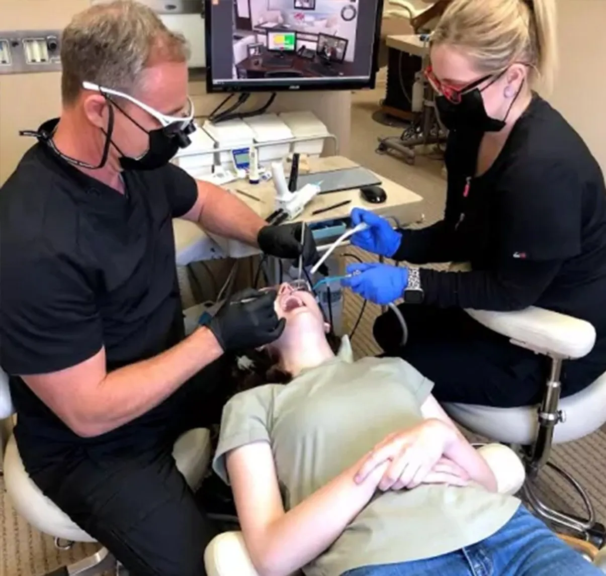 An MVP Dental dentist and assistant working chairside