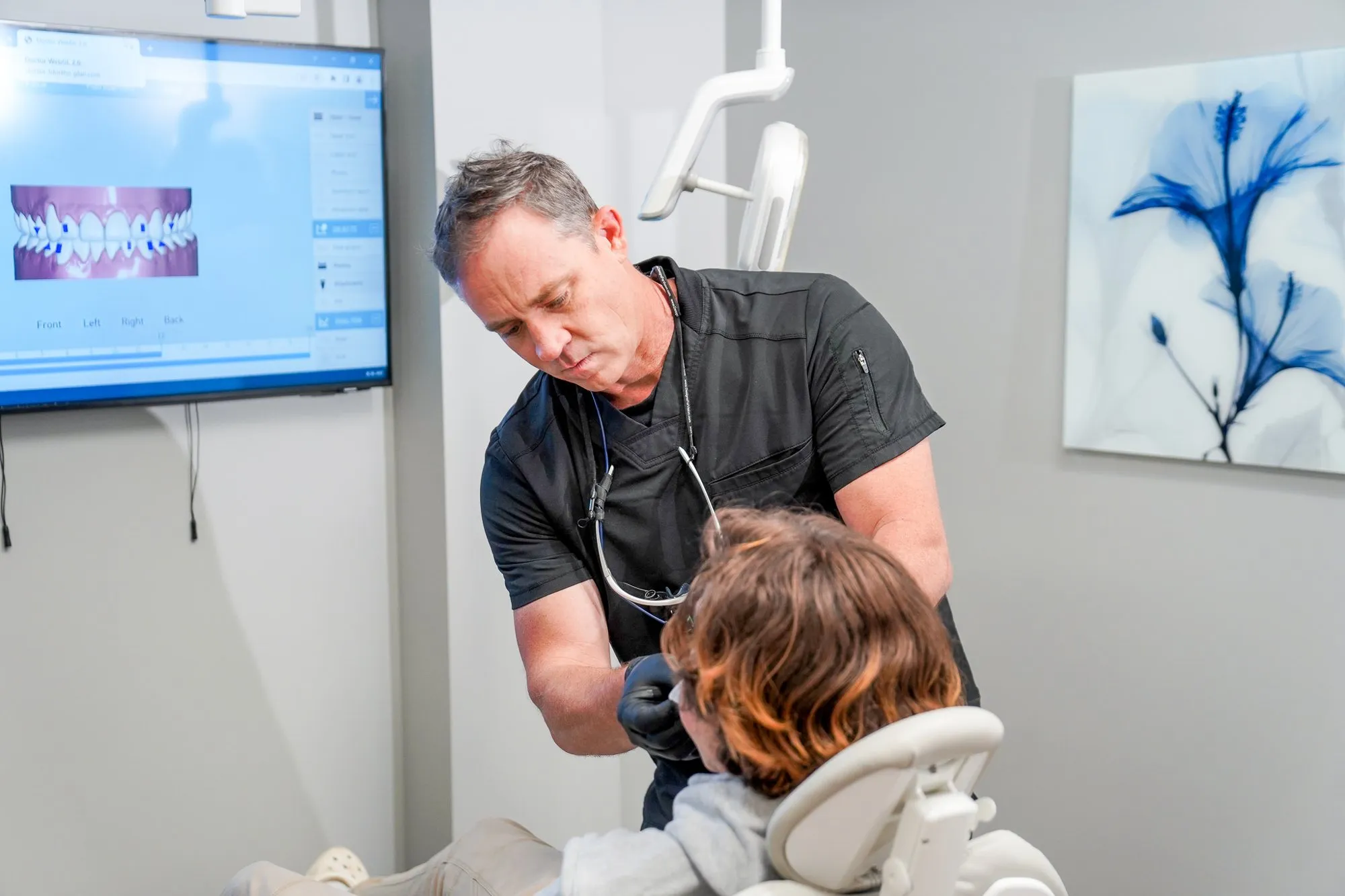An MVP Dental dentist examining a patient