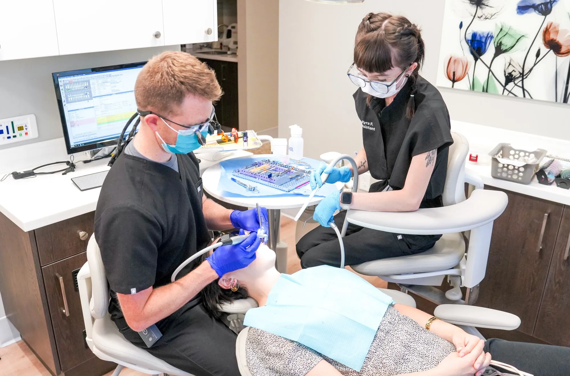 An MVP Dental dentist and assistant treating a patient in Farmington, Utah